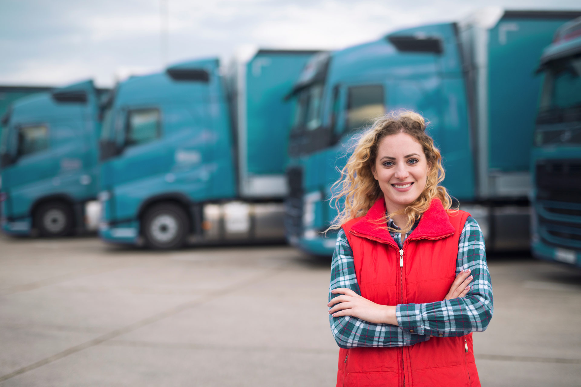 Lady standing in front of LGVs